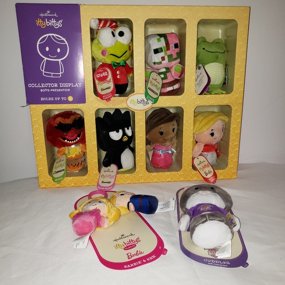 Lot of New Hallmark itty bittys with case